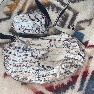 L.A.M.B LeSportsac cursive hobo bag and wrist bag Gwen Stefani